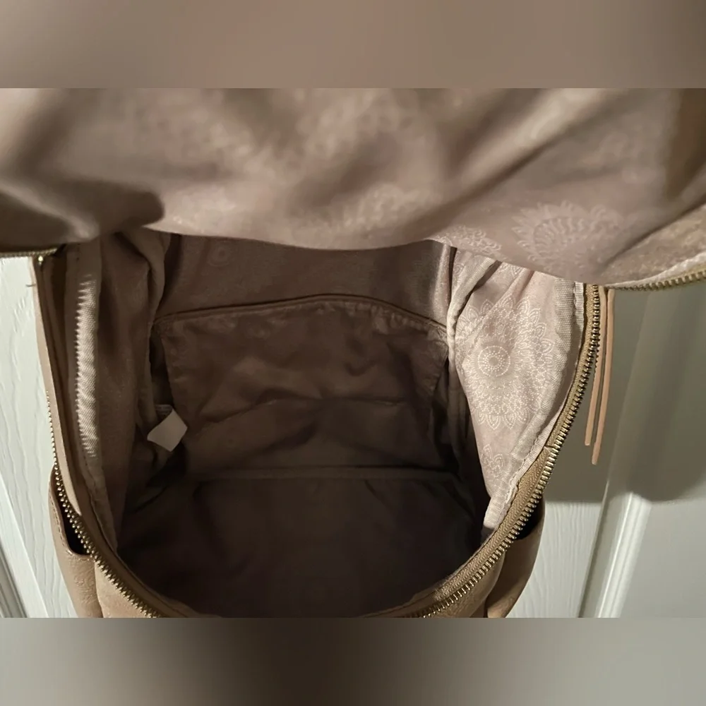 Joy Susan Backpack 
Like NEW !!!
Top 12” W11”D7”Drop 22”
Zip&Slip pockets 
EUC - Picture 4 of 8